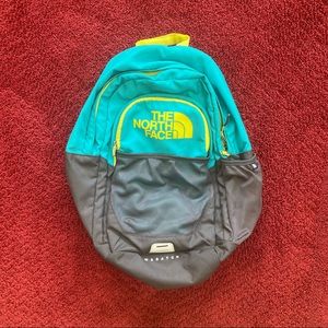 Blue and Yellow North Face Backpack